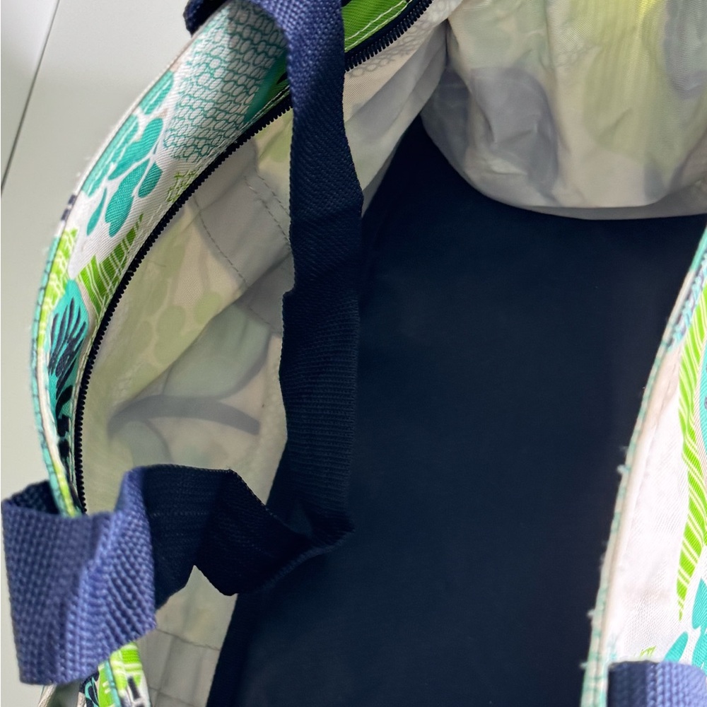 Green and Blue Floral Totes with Modern Patterns zipper close and pockets. - Picture 2 of 3